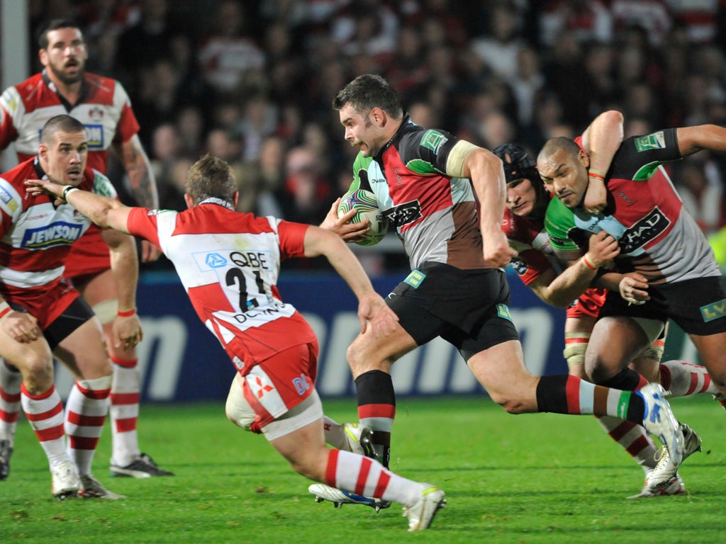Harlequins No 8 Nick Easter runs in his side's third try against Gloucester at Kingsholm