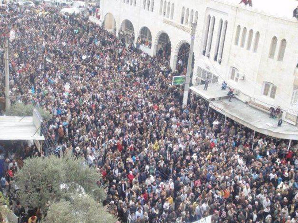 Demonstrators against Syria's President Bashar al-Assad take part in a march