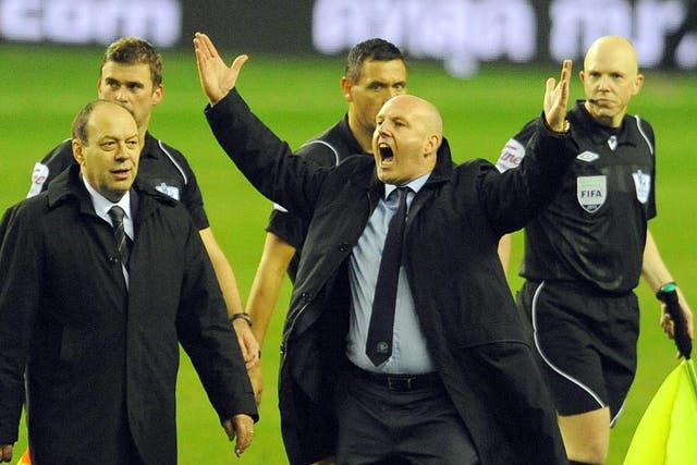 The Blackburn manager Steve Kean reacts to fans’ chants calling for his head after the final whistle