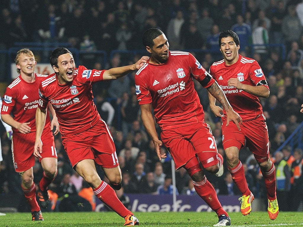 Liverpool’s Glen Johnson celebrates his winner against Chelsea