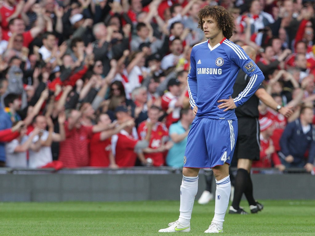 David Luiz cuts a desolate figure after gifting Javier Hernandez a goal at Old Trafford last season