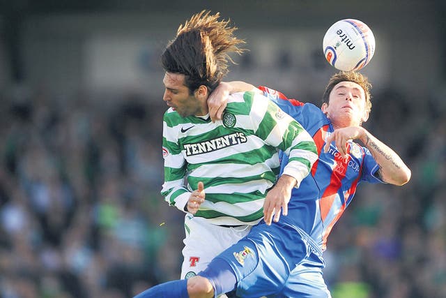 Greg Tansey (right) was sent off for this challenge on Georgios Samaras 