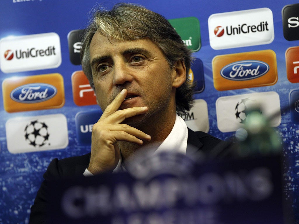 Roberto Mancini returns to Italy knowing defeat will threaten qualification