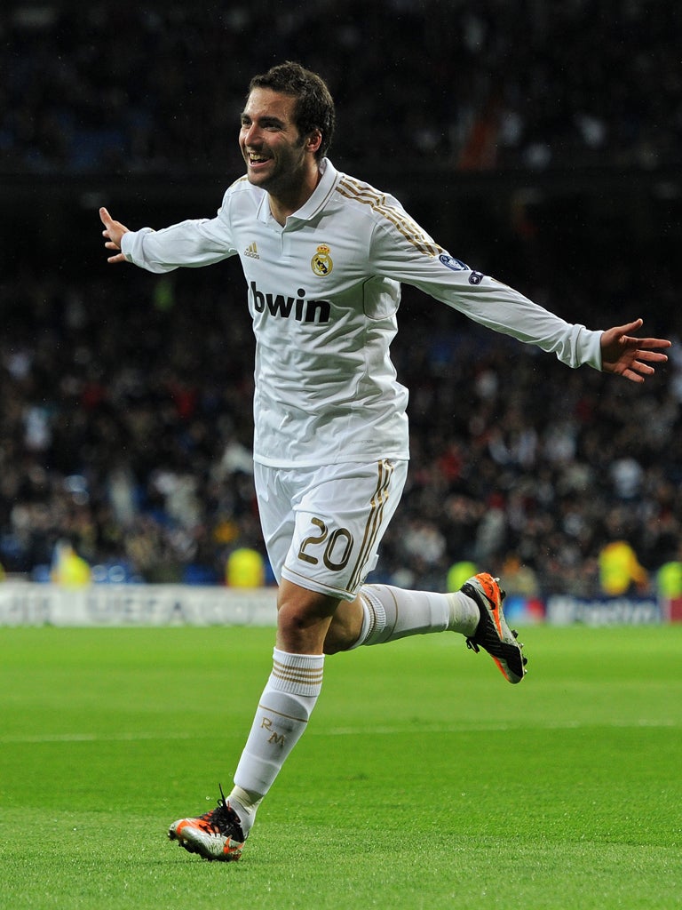 Gonzalo Higuain celebrates his goal during Real Madrid’s rout of Dynamo Zagreb at the Bernabeu