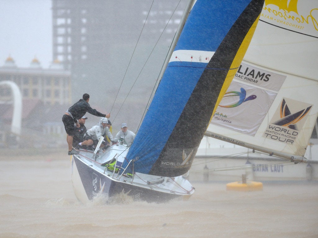 Torrid conditions for Britain's Ian Williams and his Team GAC Pindar on the first day of the Monsoon Cup finale to the World Match Racing Tour in
Malayaia