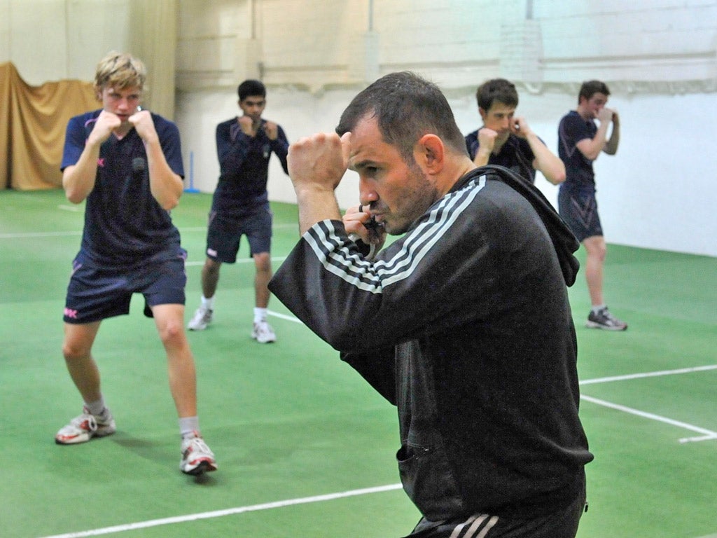 Mixed martial arts trainer - and fighter - Giorgio Andrews puts the Middlesex players through their paces