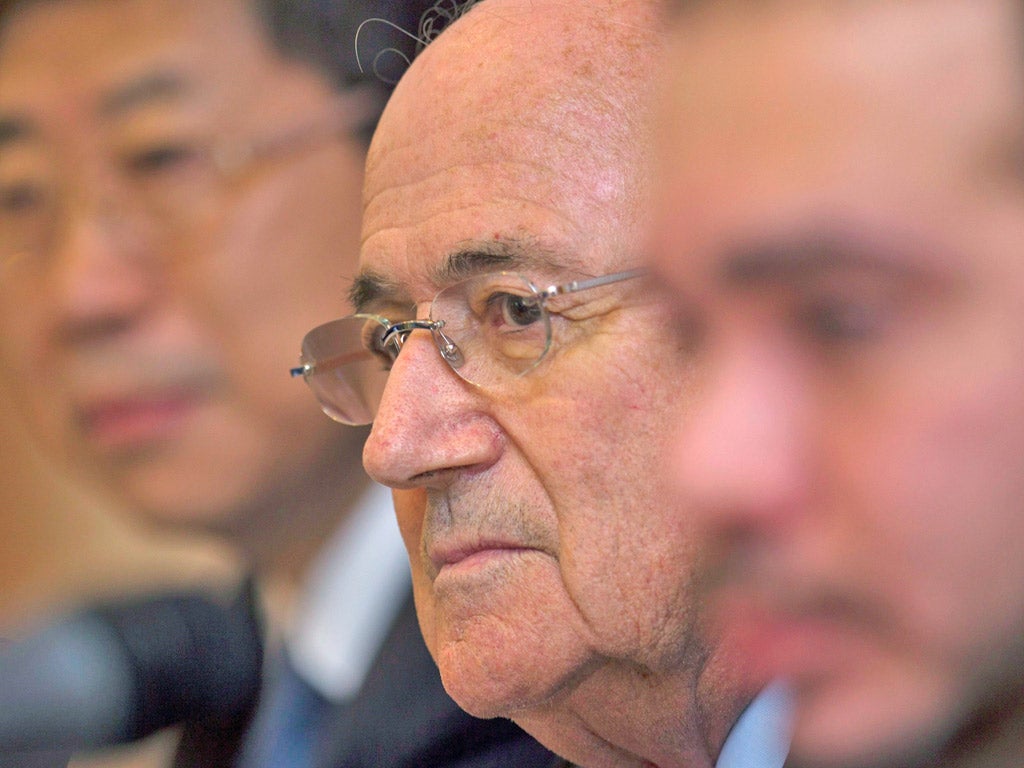 Sepp Blatter listens to some awkward questions in Kuala Lumpur yesterday