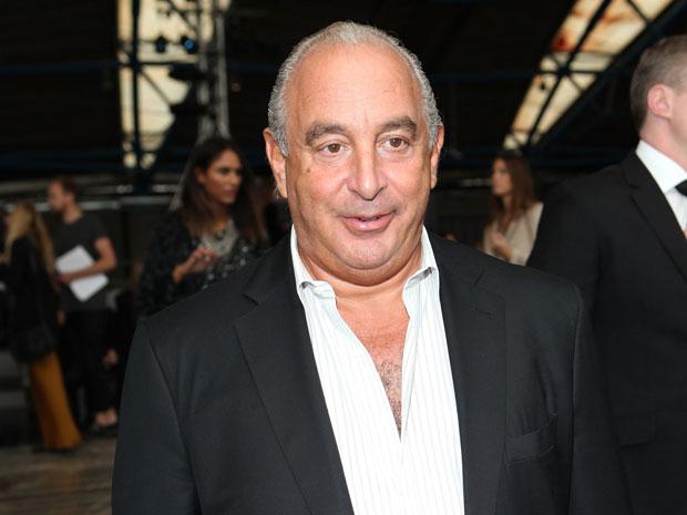 Sir Philip Green today said his retail empire had seen a near 40% slide in profits