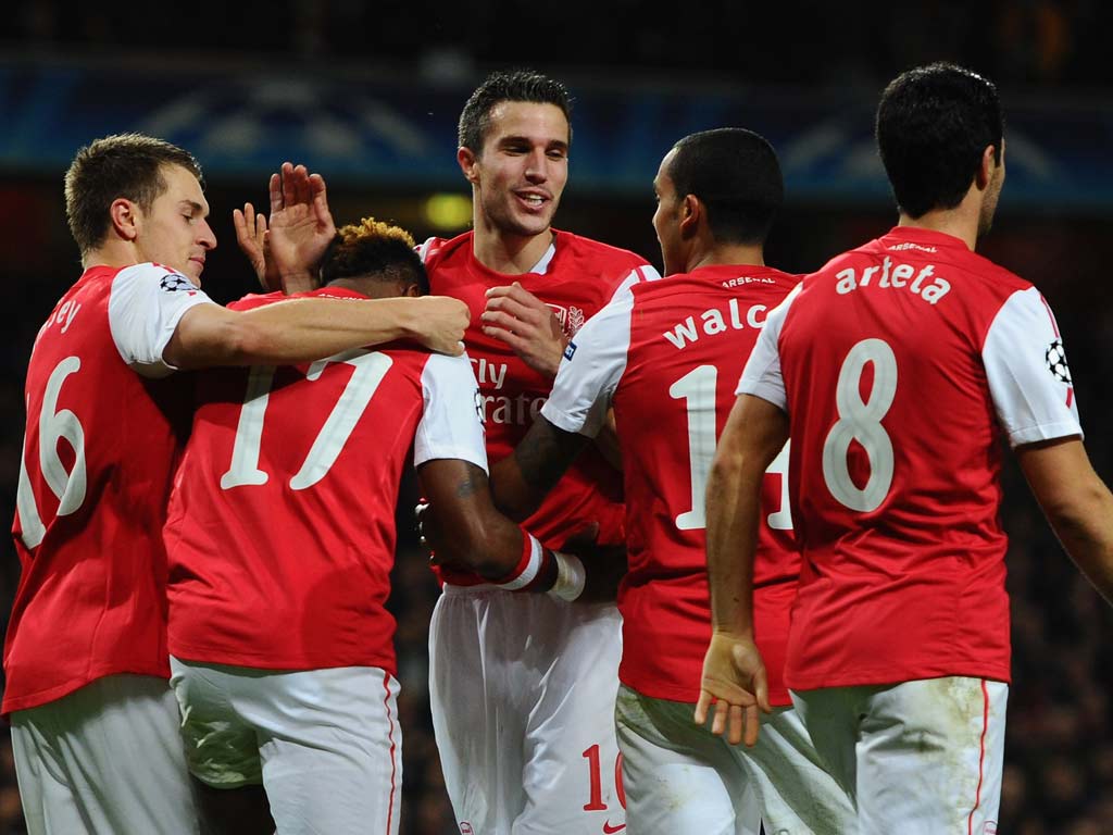 Arsenal qualified for the Champions League knock-out stage last night