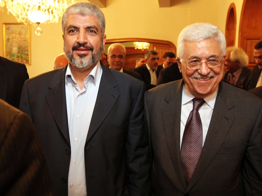 Khaled Meshaal and Mahmoud Abbas in Cairo yesterday