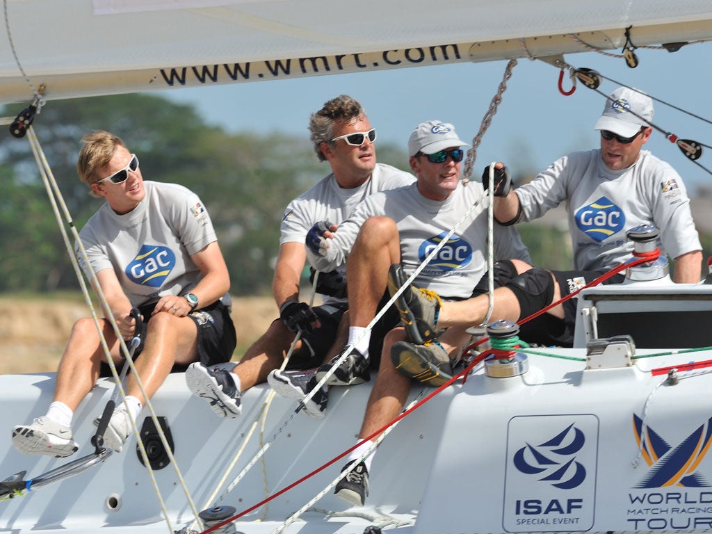 Ian Williams, left, with his Team GAC Pindar crew, on their way to a third world championship in the World Match Racing Tour in Malaysia.