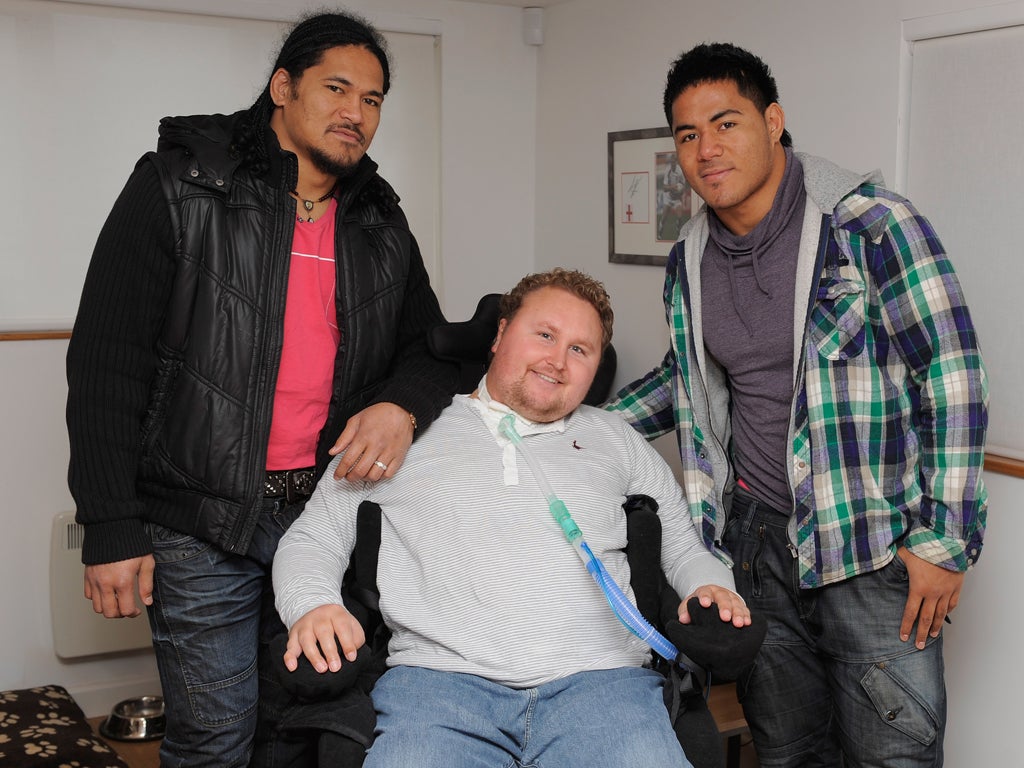 Matt Hampson, centre, with Leicester Tigers' Manu, right, and Alex Tuilagi