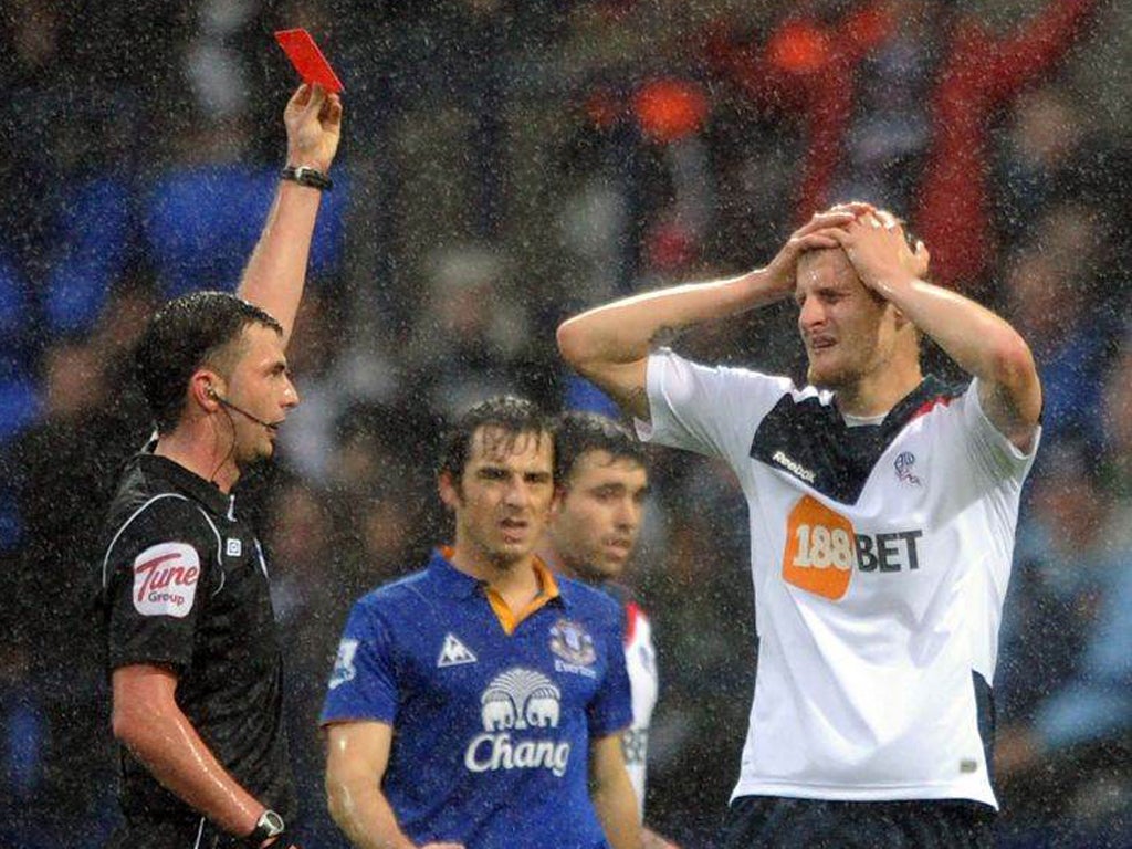 Bolton's David Wheater is given a straight red by Michael Oliver