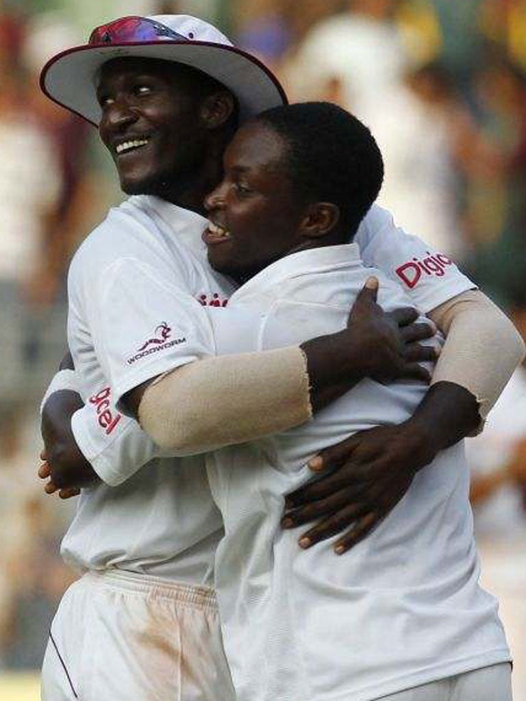 West Indies captain Darren Sammy and Fidel Edwards enjoy the draw