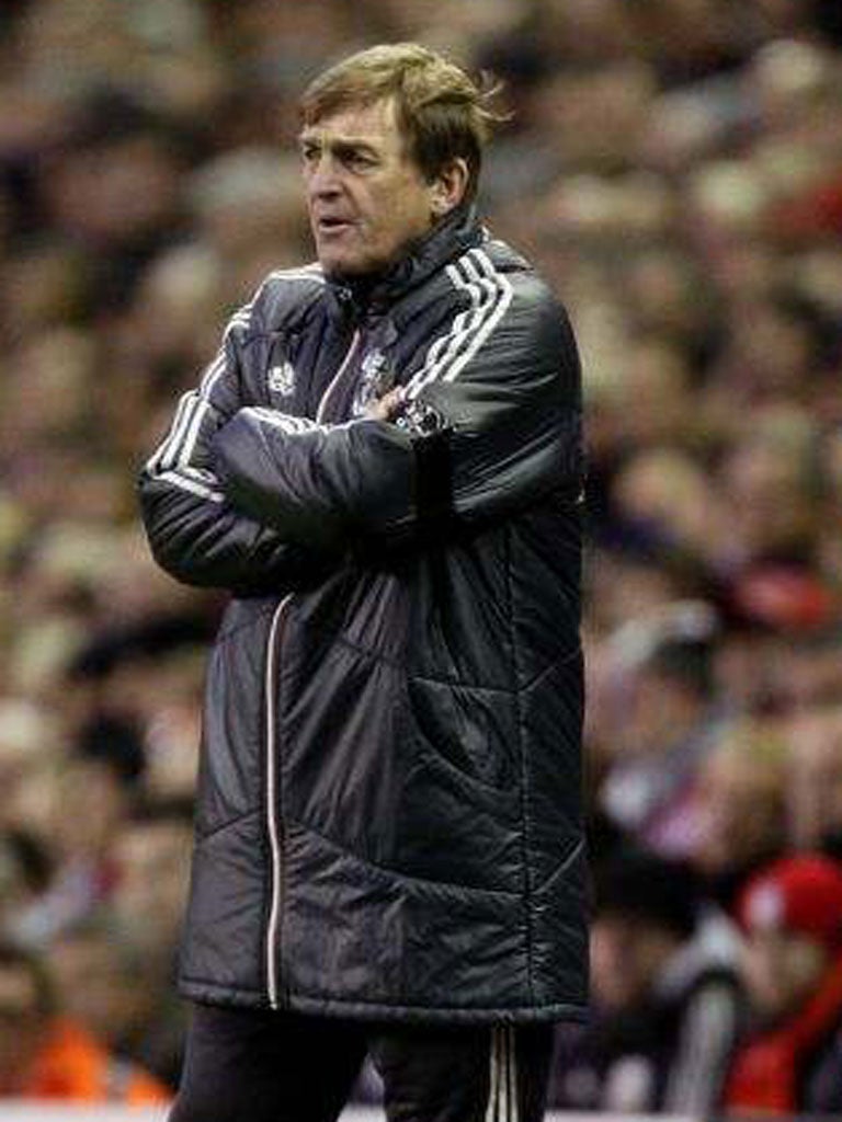 Kenny Dalglish watches his Liverpool side at Anfield