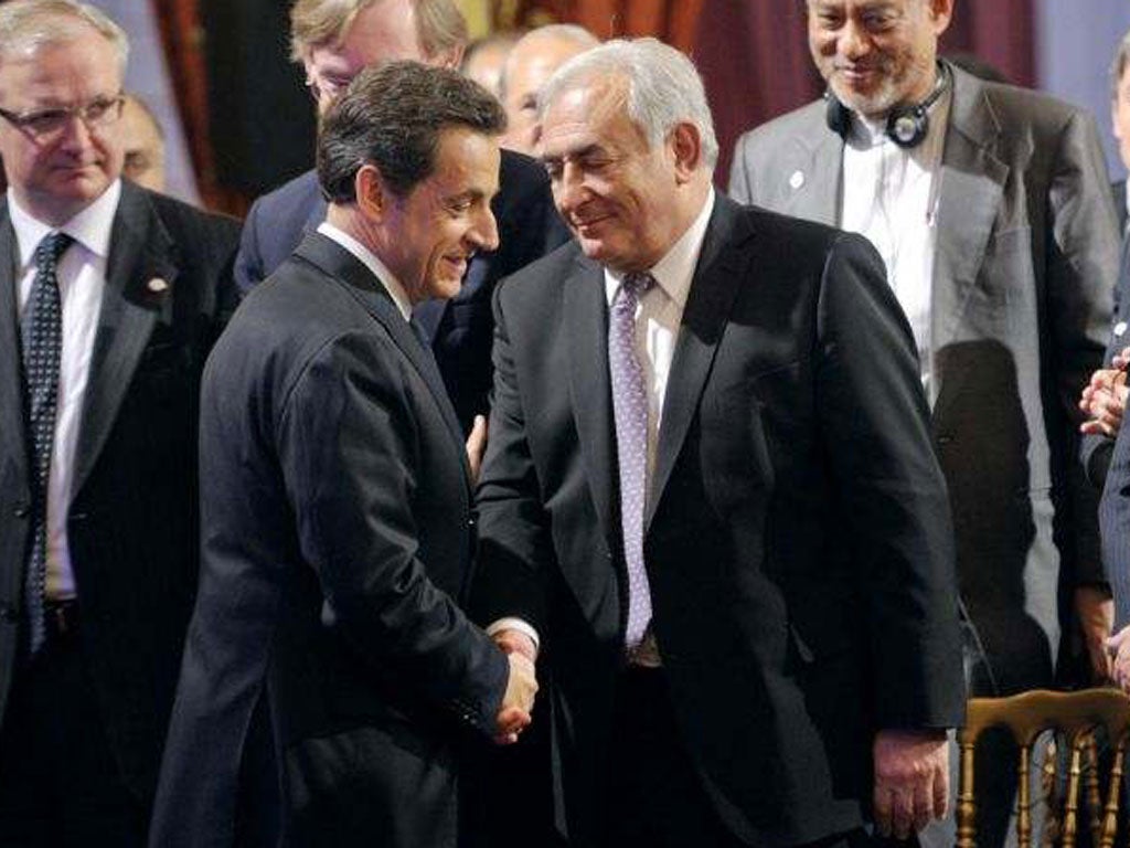 Strauss-Kahn, right, and Sarkozy meet at a G20 meeting in February