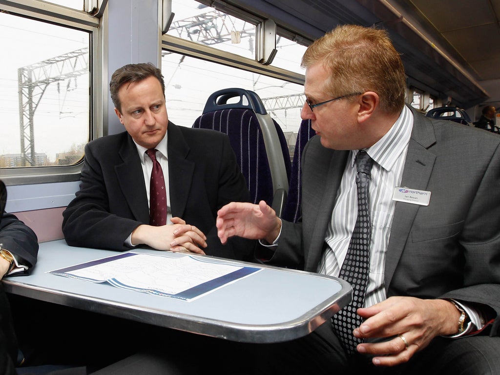 David Cameron visiting a Northern Rail depot in Manchester yesterday