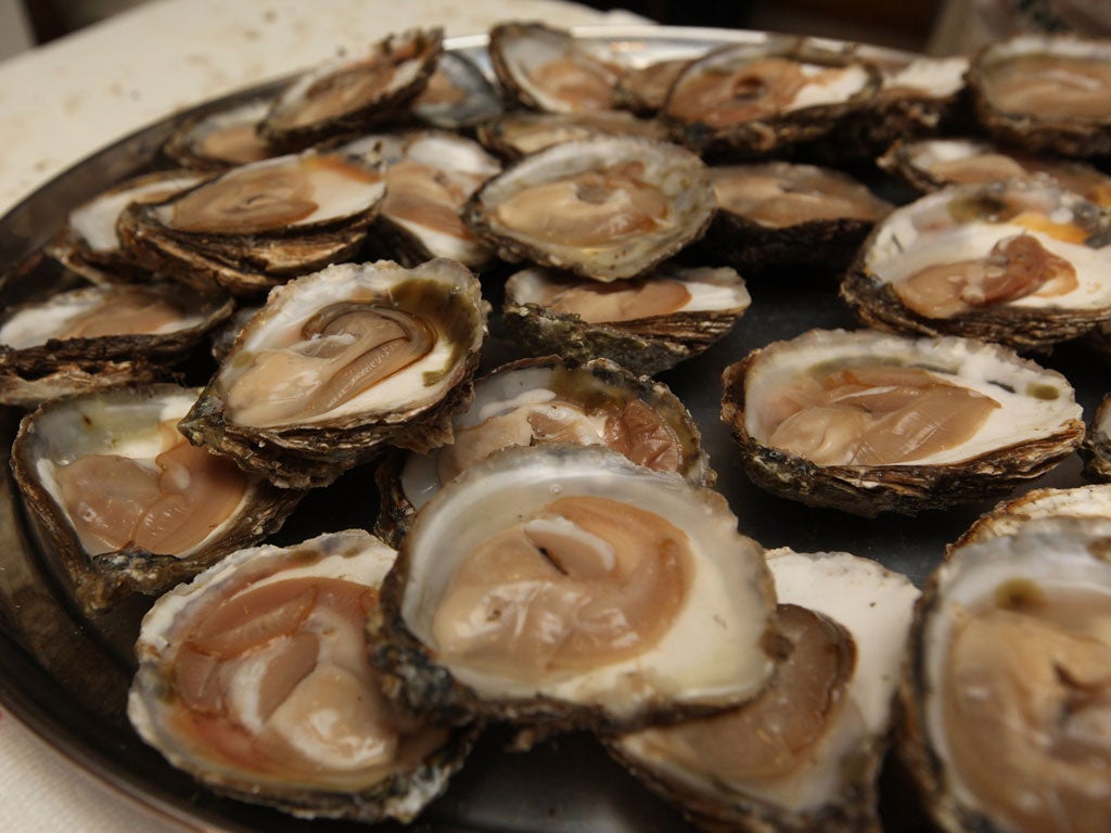 A man has died after eating raw oysters from a St Louis food stand