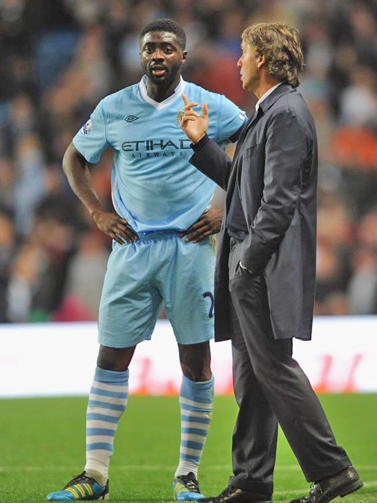 Kolo Touré thinks City can go the whole season unbeaten only if they 'forget about' the feat