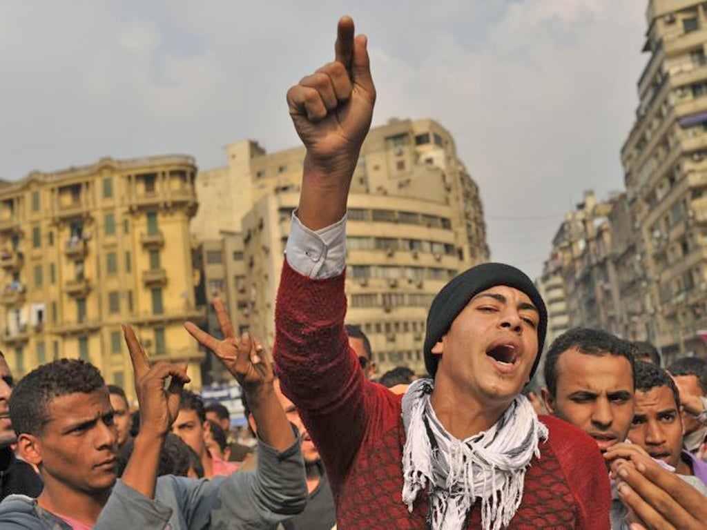 Egyptians protest against military rule in Tahrir Square yesterday
