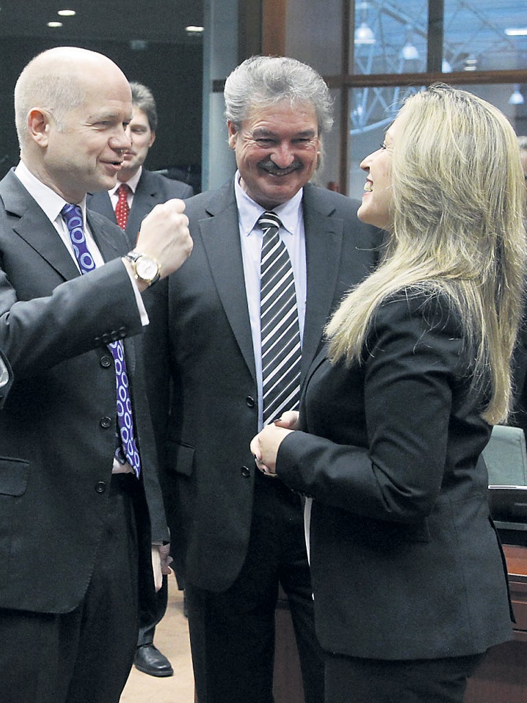 Left to right: Britain’s William Hague, Jean Asselborn of Luxembourg and Spain’s Trinidad Jiménez at the EU foreign ministers meeting 