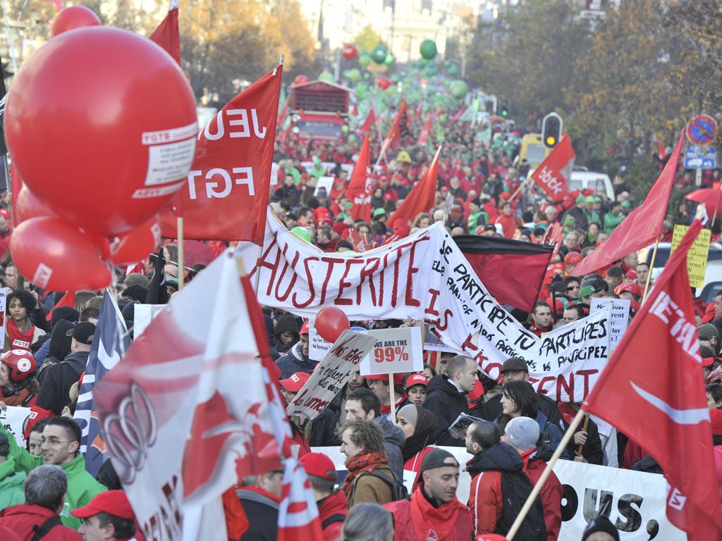 Protestors march during the demonstration in the streets of Brussels