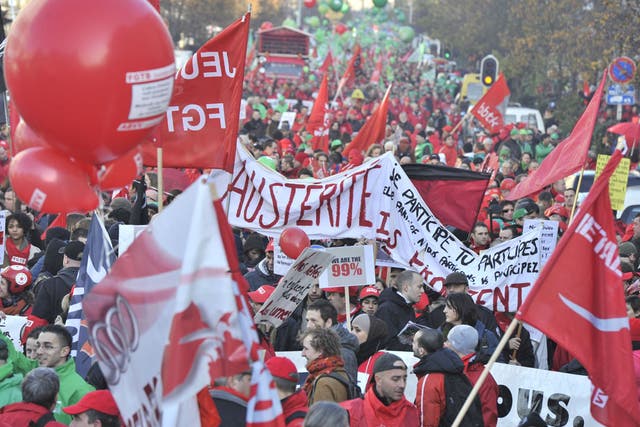 Protestors march during the demonstration in the streets of Brussels