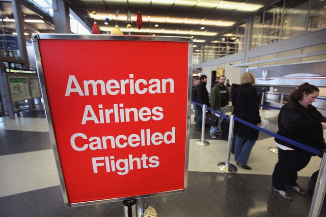 <p>Grounded: American Airlines passengers have been told that dozens of flights in December to London are cancelled</p>