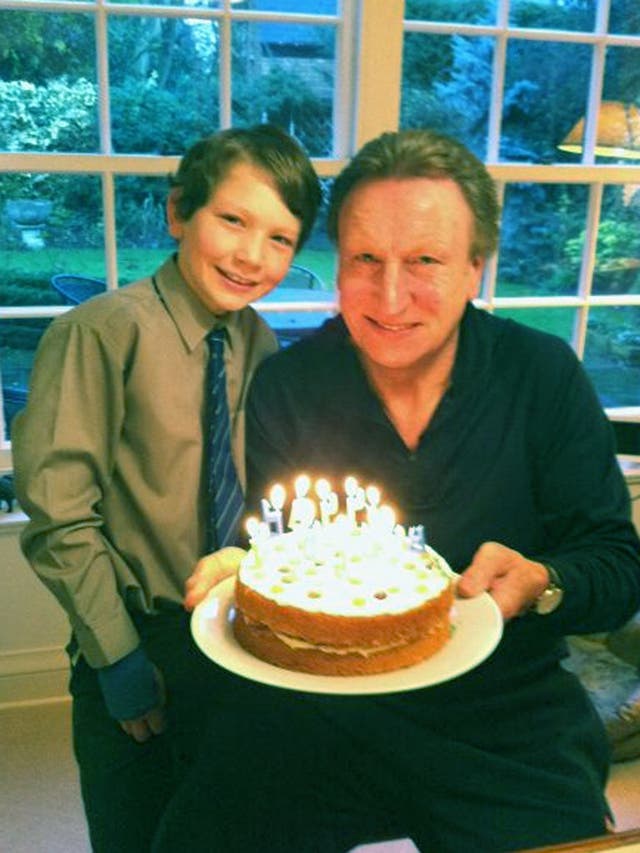 Will and I with my birthday cake. There wasn't room for 63 candles