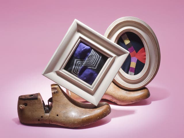 1. Wooden shoe lasts, £49.95, Selfridges; purple patterned socks, £17, Paul Smith; Duchamp multi-striped socks, £16.95, Harrods; oval frame, £11, and square frame, £9, John Lewis