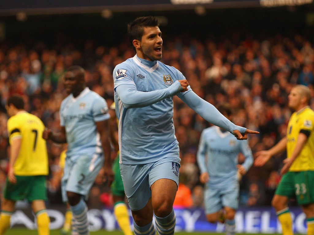 Aguero of Manchester City celebrates scoring the first goal