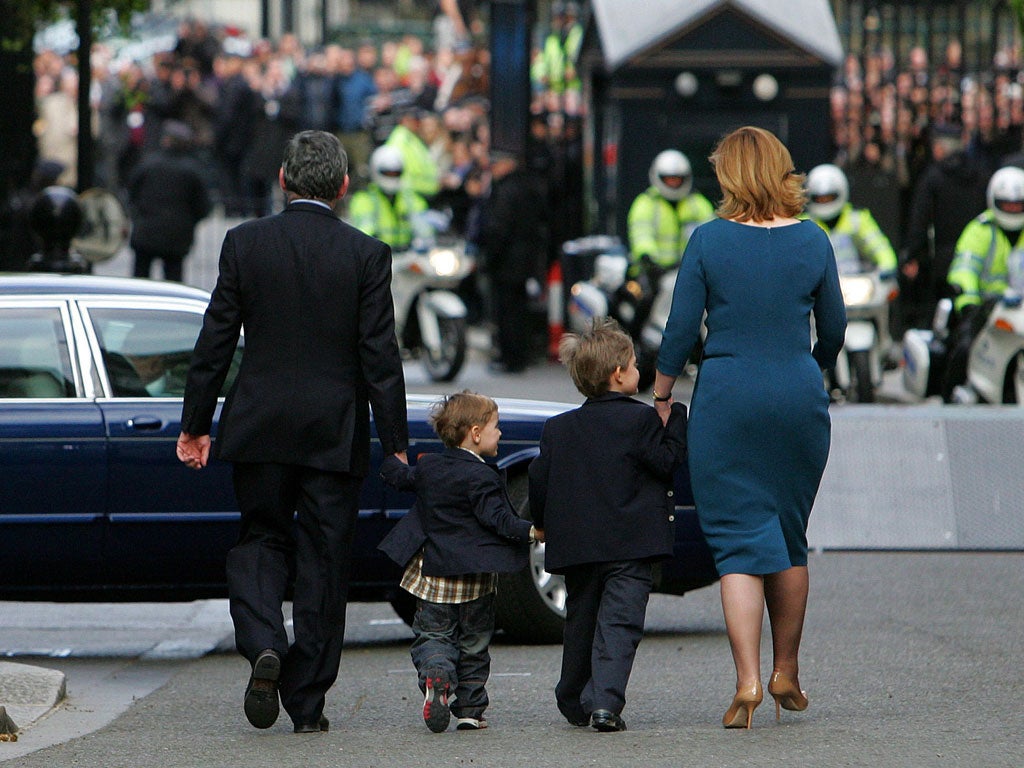 Time to look back: Gordon Brown, his wife Sarah, and their sons John and James, leaving Downing Street