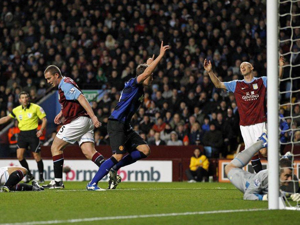 Manchester United's Phil Jones celebrates after volleying his side in front at Villa Park last night