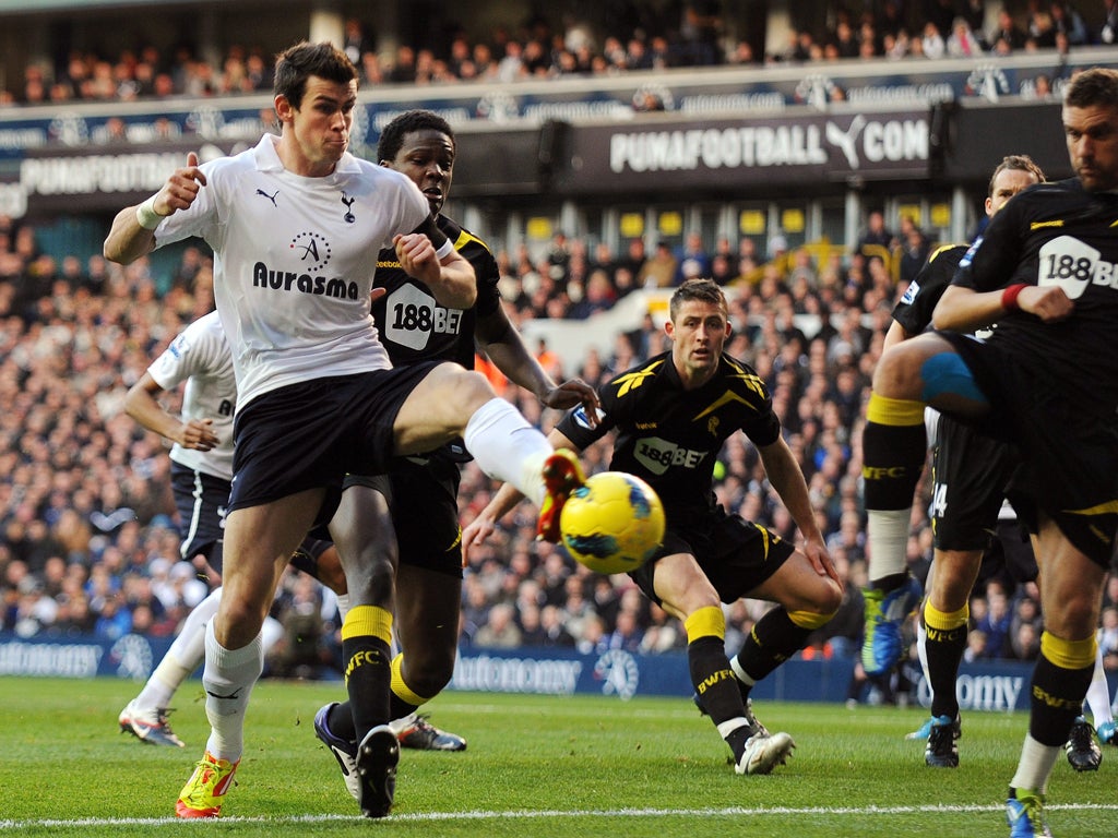 Tottenham's Gareth Bale gets to a corner kick ahead of Dedryck Boyata to opening the scoring
