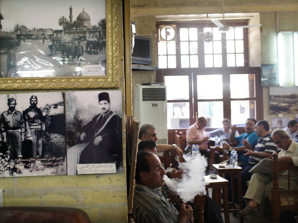 Even though life looks normal at Baghdad's Al-Shah Bender Café, car bombs are still a regular occurrence