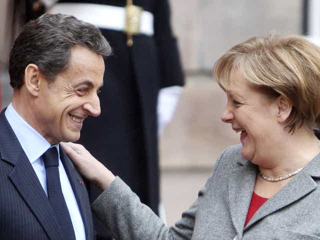 France's Nicolas Sarkozy and Germany's Angela Merkel are trying to stand united