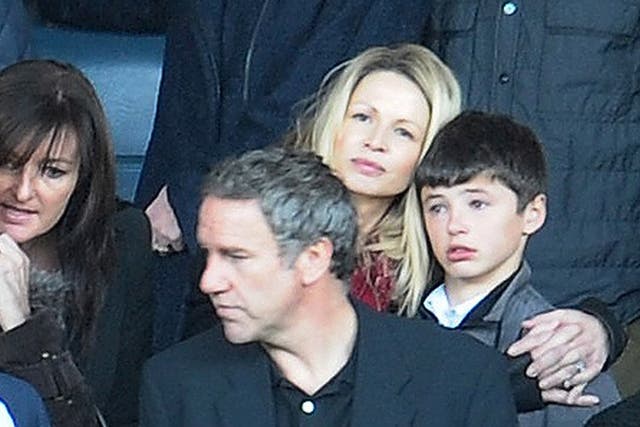 Gary Speed's widow Louise with their son in the stands yesterday