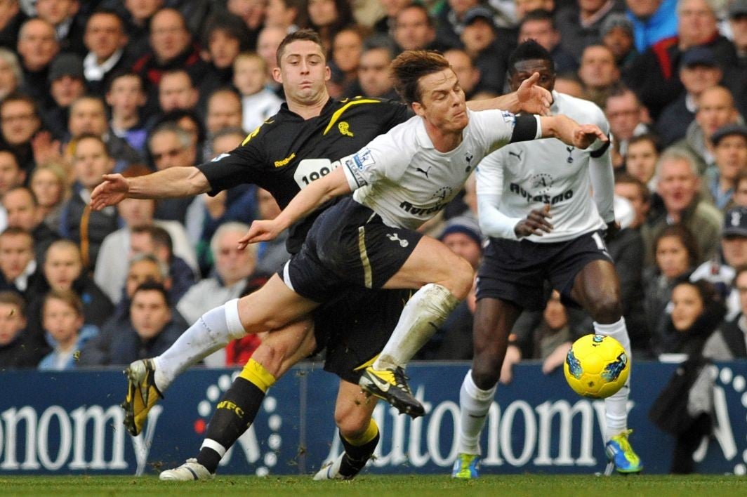 The challenge on Scott Parker that saw Bolton's Gary Cahill, left, sent off on Saturday