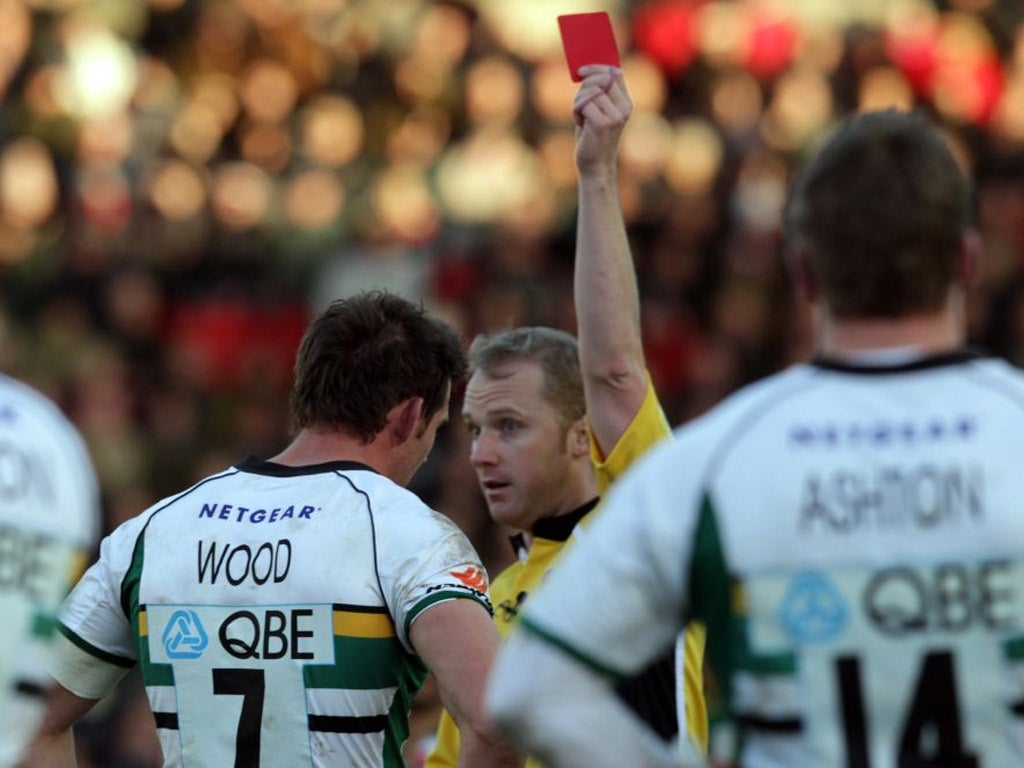 Northampton's Tom Wood is shown a red card during the Premiership match with Leicester at Welford Road at the weekend
