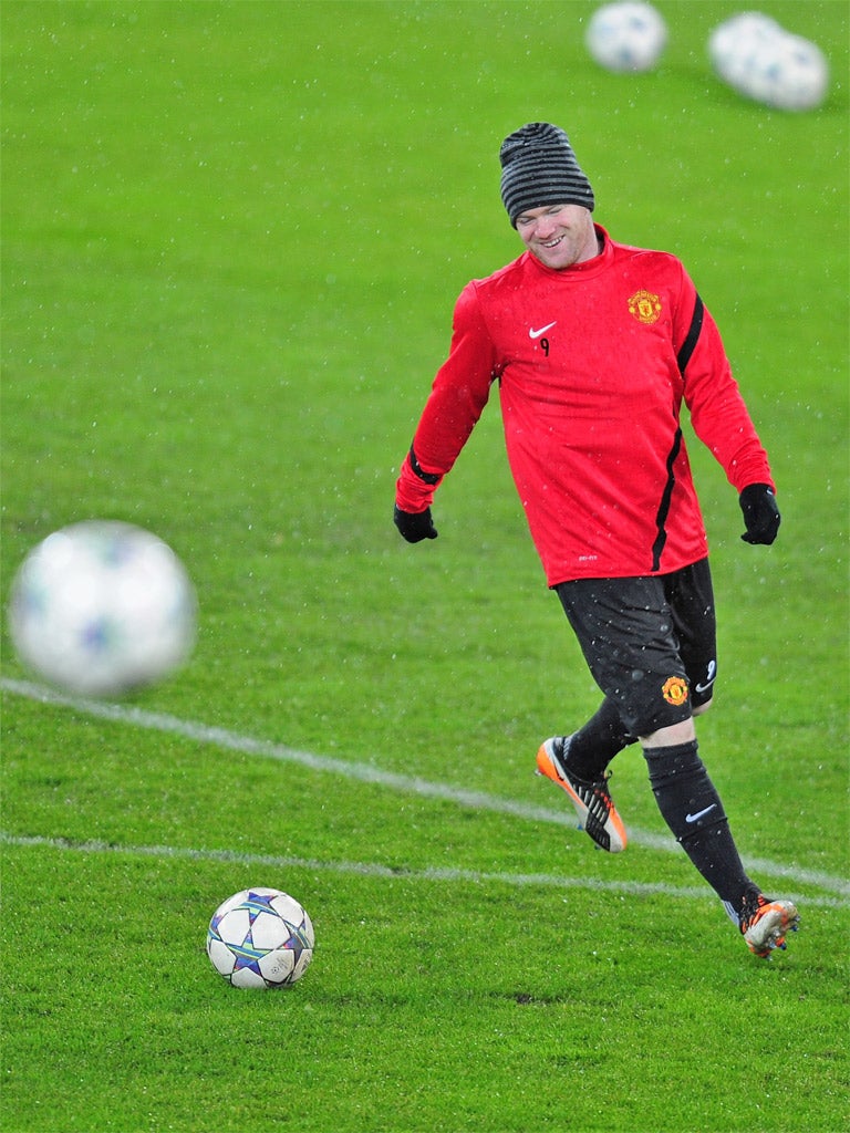 Wayne Rooney's headgear is certainly a laughing matter as United train at St Jakob-Park last night