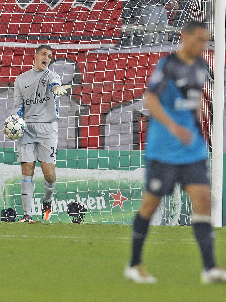 Arsenal's Vito Mannone came on to replace the injured Lukasz Fabianski and endured an uncomfortable night in goal