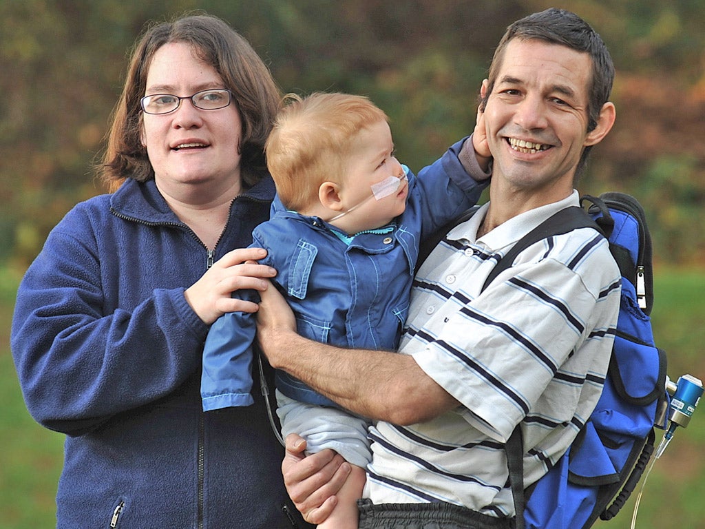 Emma West and Mark Rowe with Lewis, who has the same condition that killed his sister