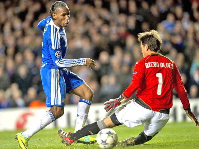 Didier Drogba scores one of his two goals against Valencia on Tuesday