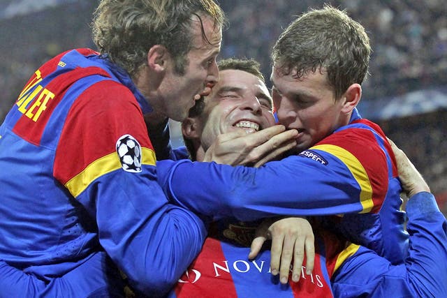 Alex Frei (middle) celebrates with teammates after scoring Basle's second goal 