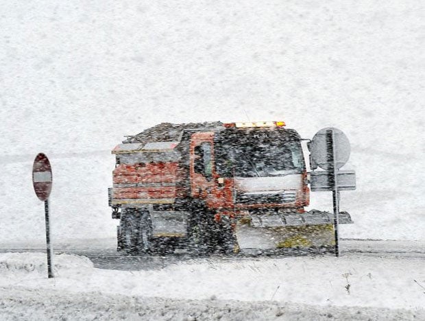 A snow plough gets to work on the A66 between Yorkshire and Cumbria to keep the main trans Pennine routes open