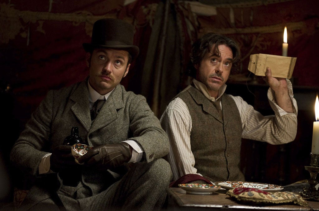 A case of identity: Jude Law (left) and Robert Downey Jr as a
very different Watson and Holmes to the traditional duo in Guy Ritchie’s second big budget 'Sherlock Holmes' movie