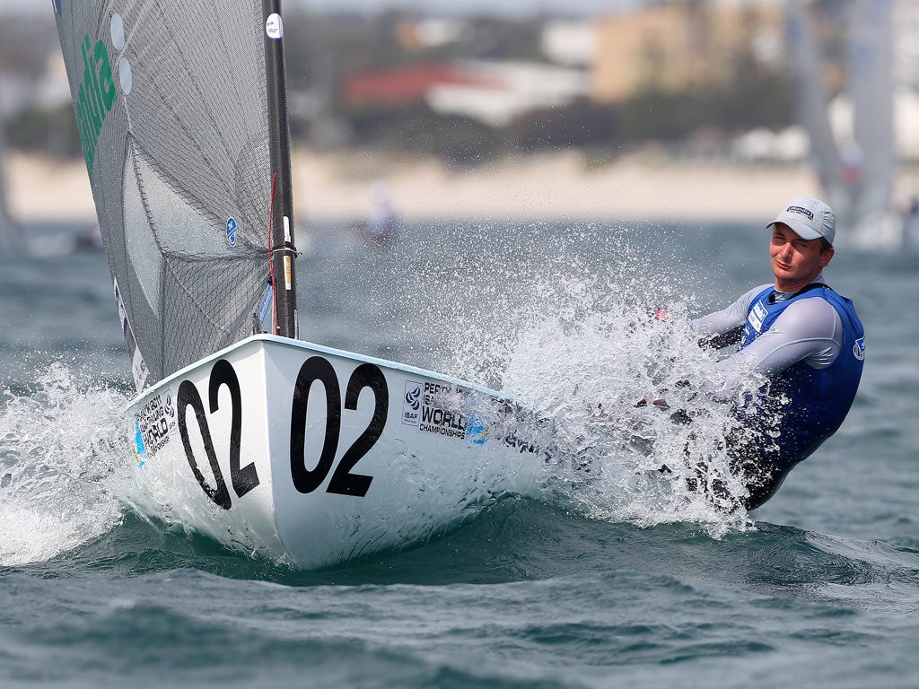 Wearing number two and lying second Giles Scott is determined to challenge Olympic champion Ben Ainslie for the Finn title at the world championships of sailing off Fremantle, W Australia