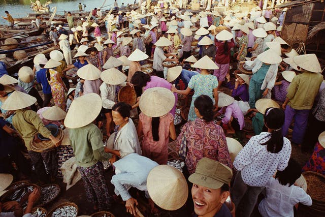 Hats off: A busy Vietnamese fish market