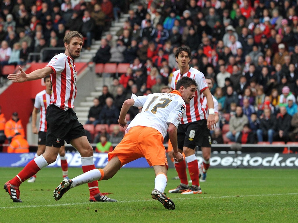 Chris Basham (right) sparks Blackpool hopes with their opening goal