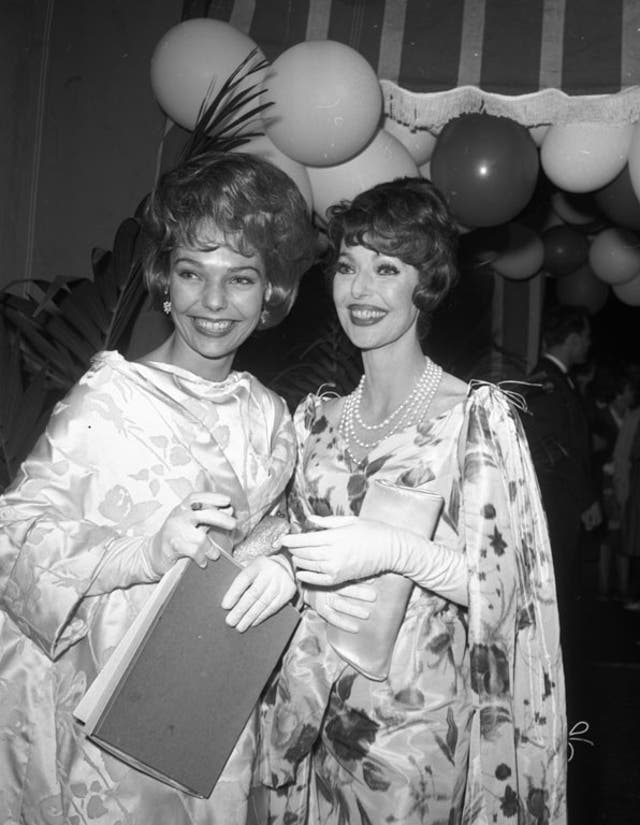 Lewis, left, and her mother Loretta Young at a party in 1961